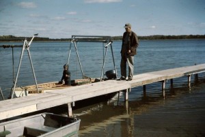 Jim Peterson with Grandpa Louis Haney at Horseshoe Haven early 1960's